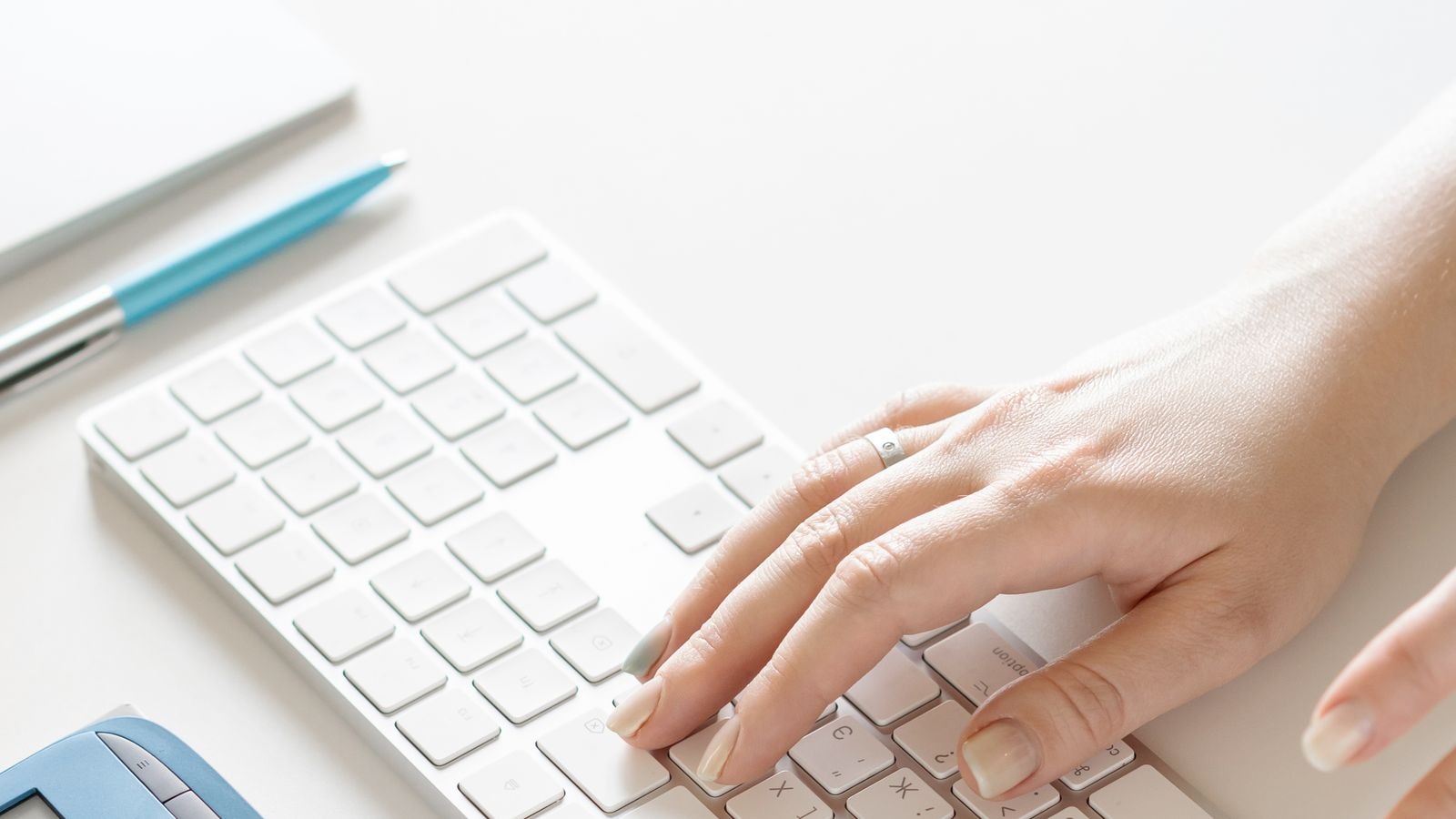 Close-up of a tented ergonomic keyboard showing angled key layout for writers