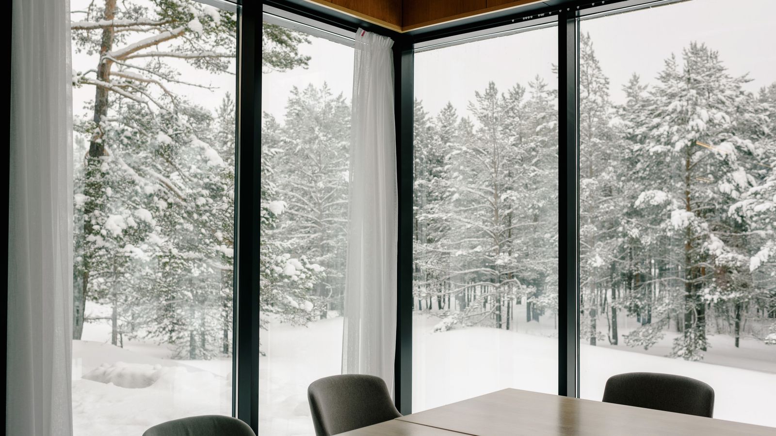 Cozy home office setup with a padded office chair suited for a cold room