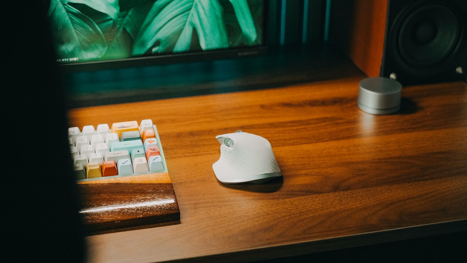 Person typing on a split ergonomic keyboard designed to reduce wrist pain