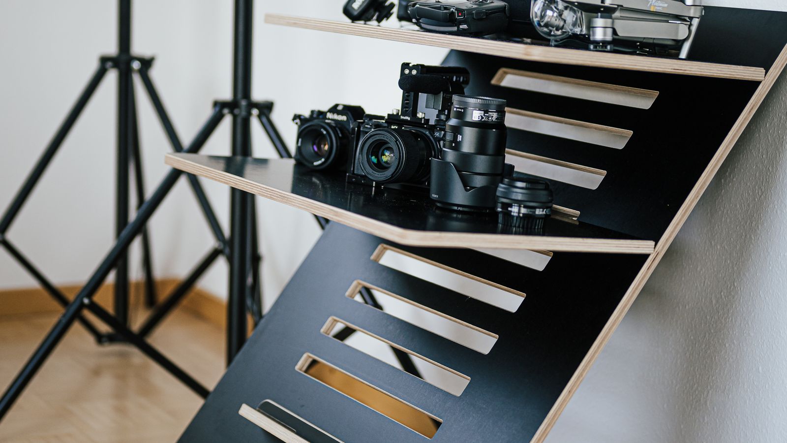 Electric standing desk with dual monitors in a modern home office