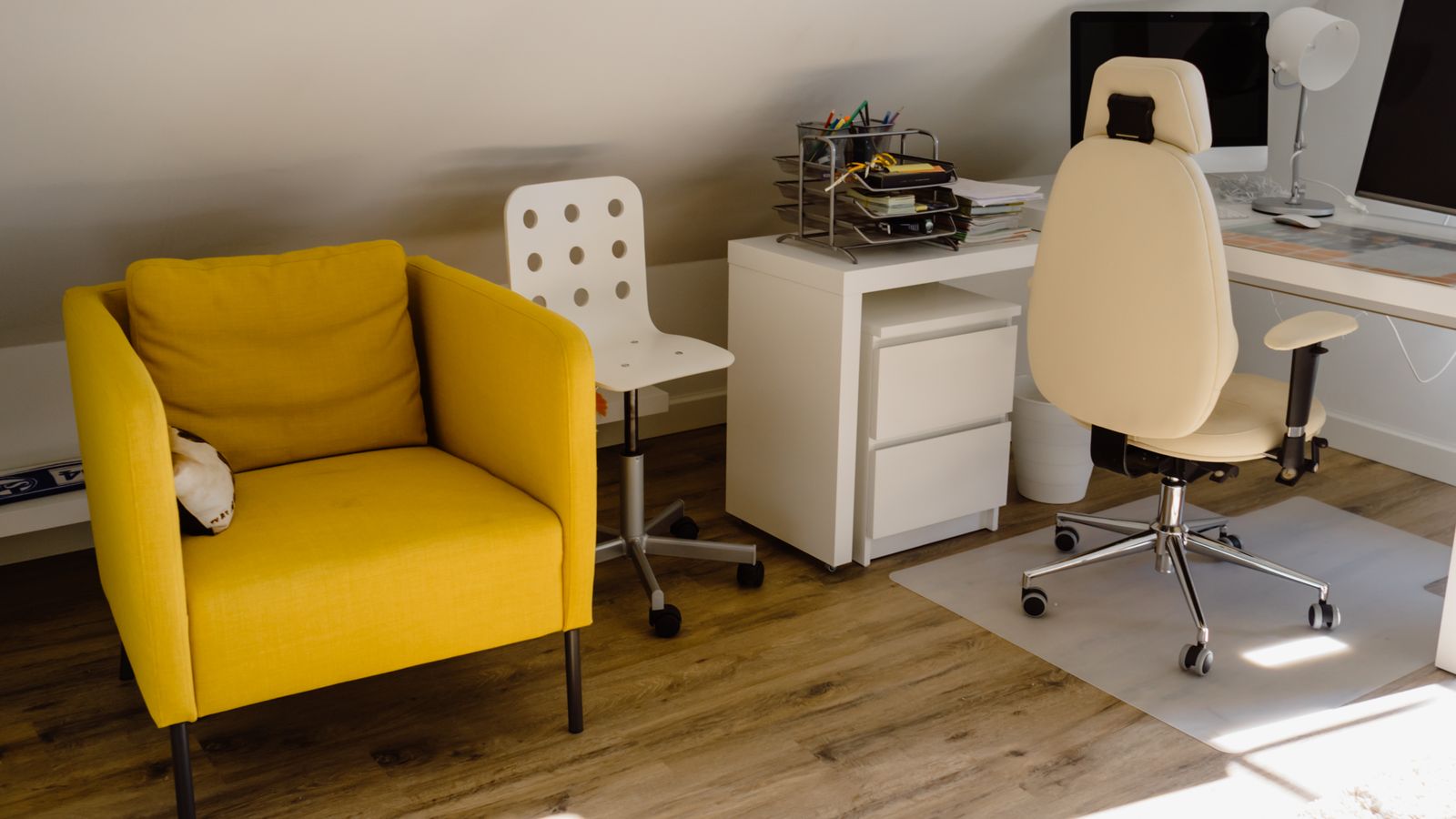 Ergonomic comfort kit bundle with a chair mat, footrest, and back support cushion arranged for gifting
