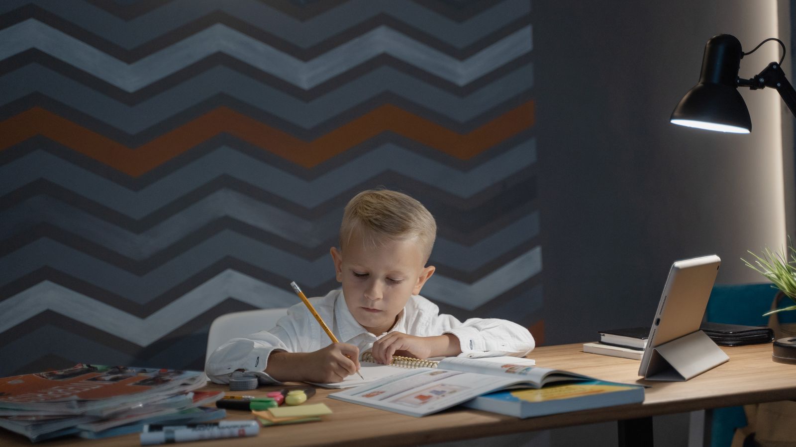 Adjustable homework desk and chair set up for a school-age child