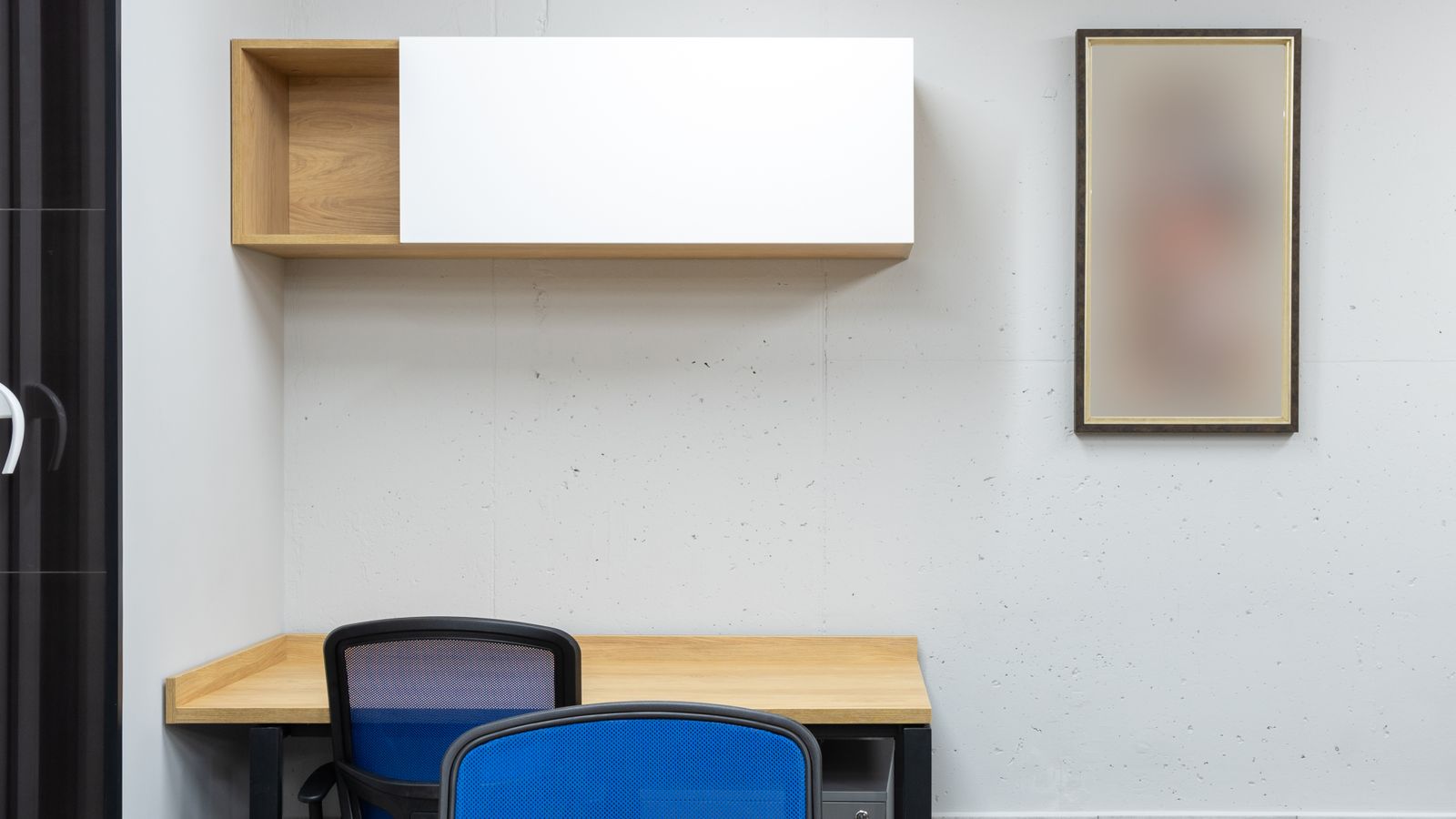 Home office desk setup with organized storage drawers and desk accessories