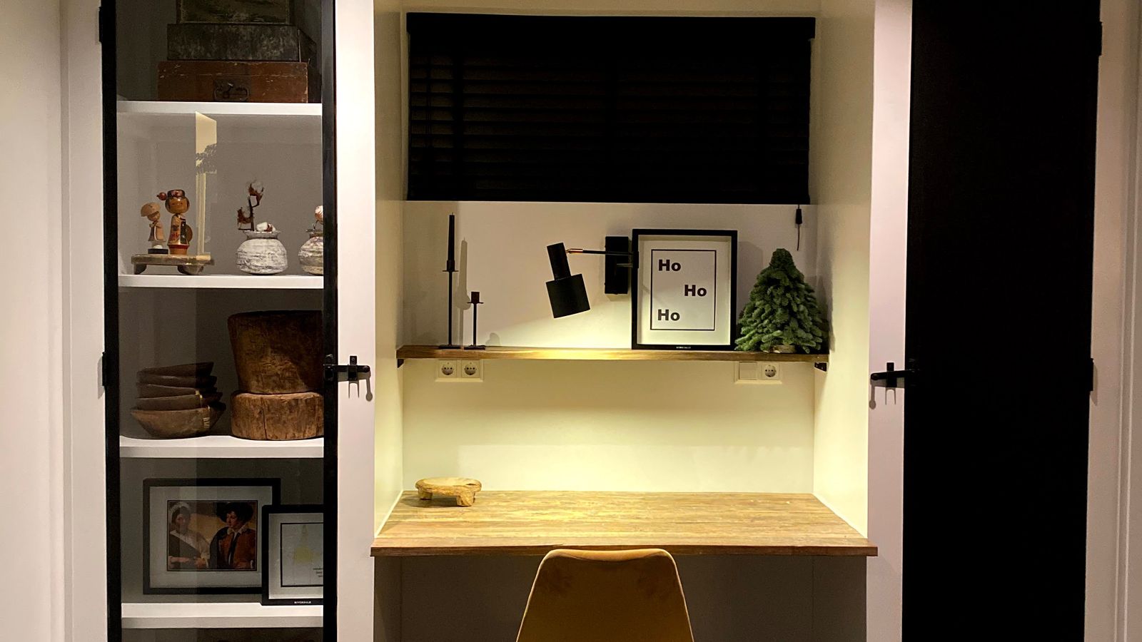 Close-up of a home office desk and chair setup showing furniture condition in a lower-level room