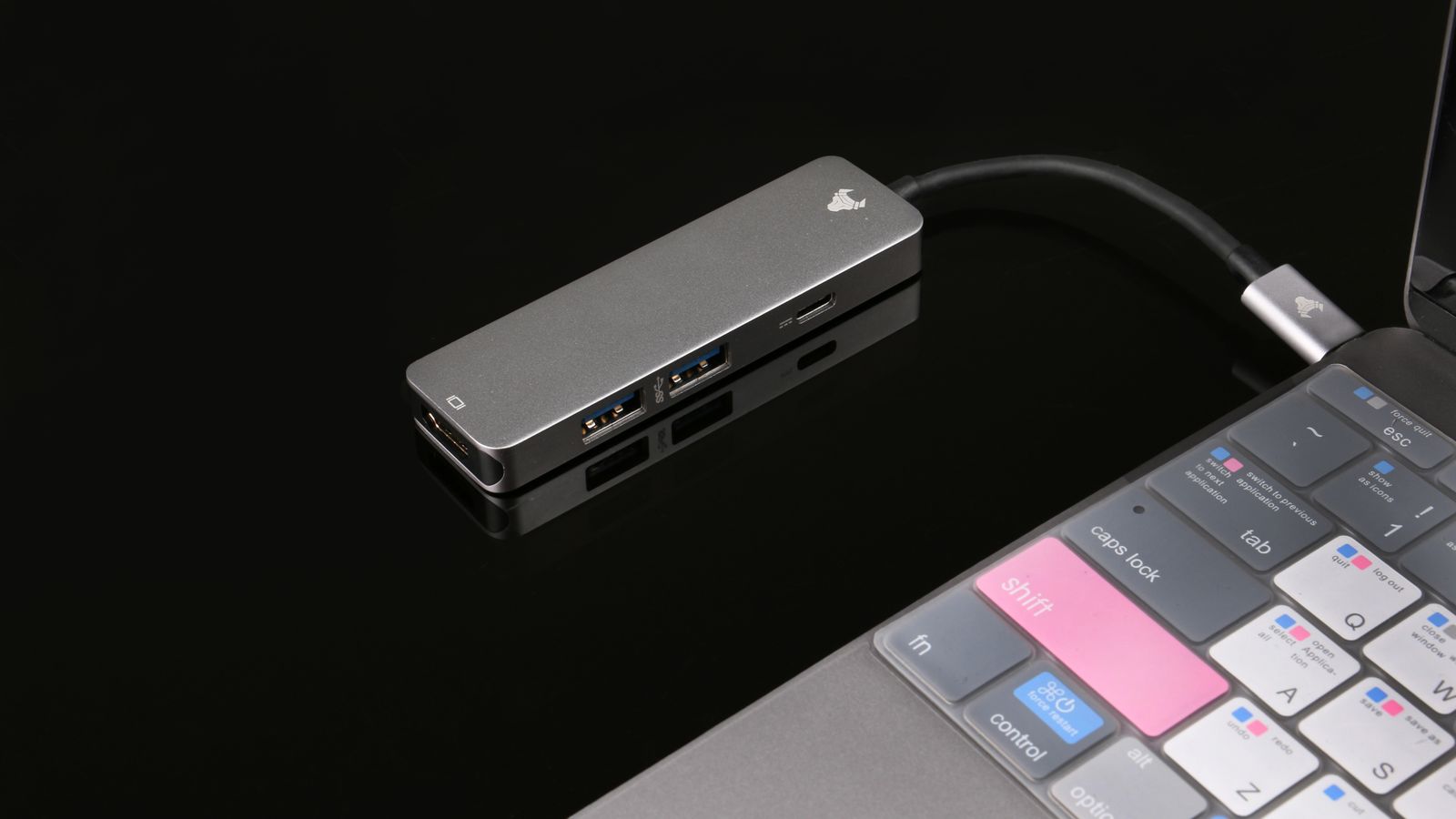 Close-up of USB-C hub ports with cables connected for a multi-monitor workstation