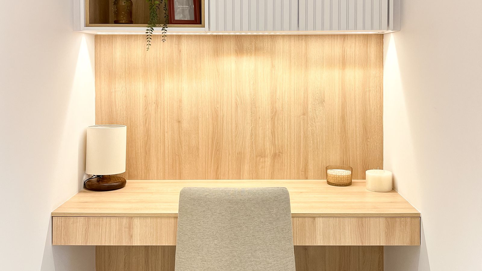 Compact wall mounted desk installed in a small home office corner
